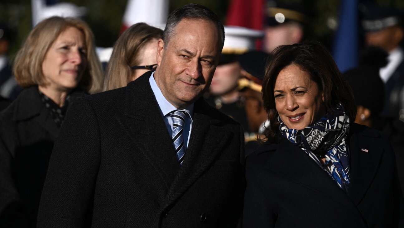 US Vice President Kamala Harris and Second Gentleman Doug Emhoff wait for the welcoming ceremony for French President Emmanuel Macron and his wife Brigitte Macron at the White House, Dec. 1, 2022. (Brendan Smialowski/AFP via Getty Images)