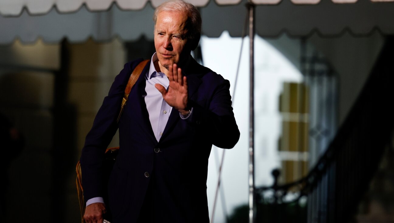 President Joe Biden walks to speak to reporters as he and first lady Jill Biden leave the White House and walk to Marine One on the South Lawn, Dec. 27, 2022. (Anna Moneymaker/Getty Images)