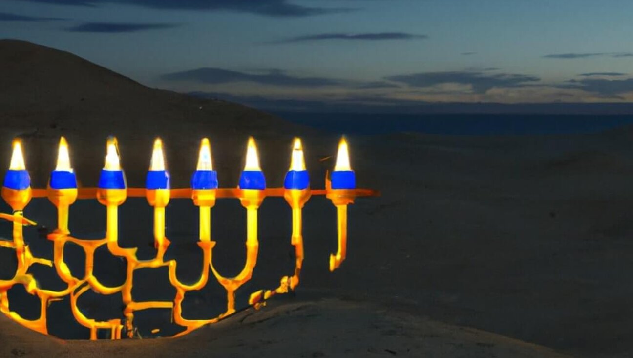 An AI-generated image of the hanukiah lit in the Israeli desert. 