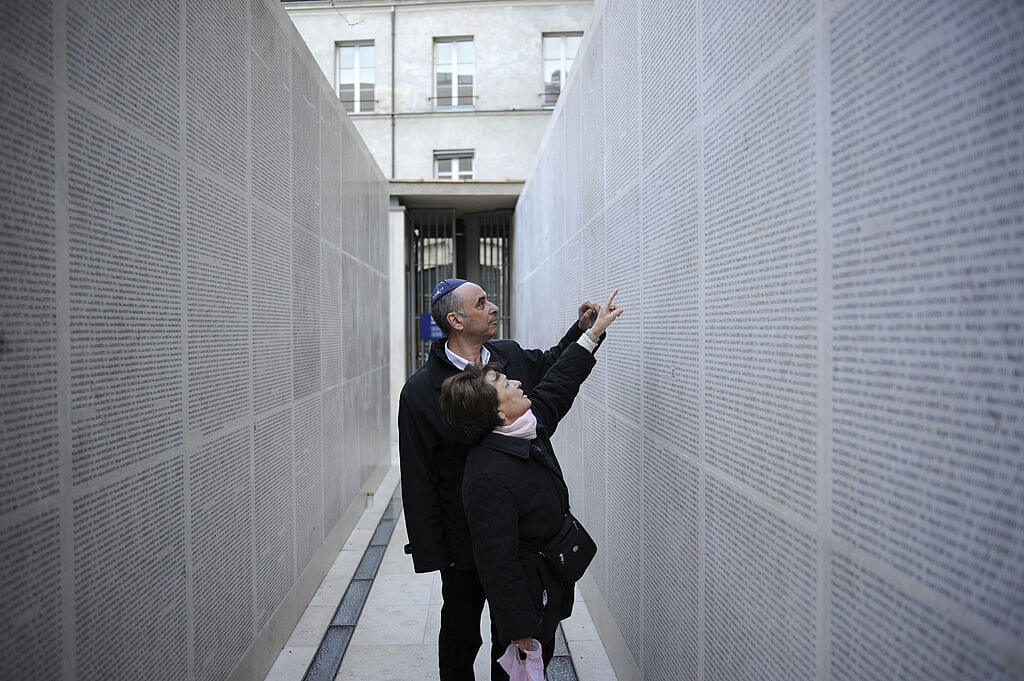 The Wall of Names, listing 76,000 Jews deported from France during World War II, at the Shoah Memorial in Paris.
