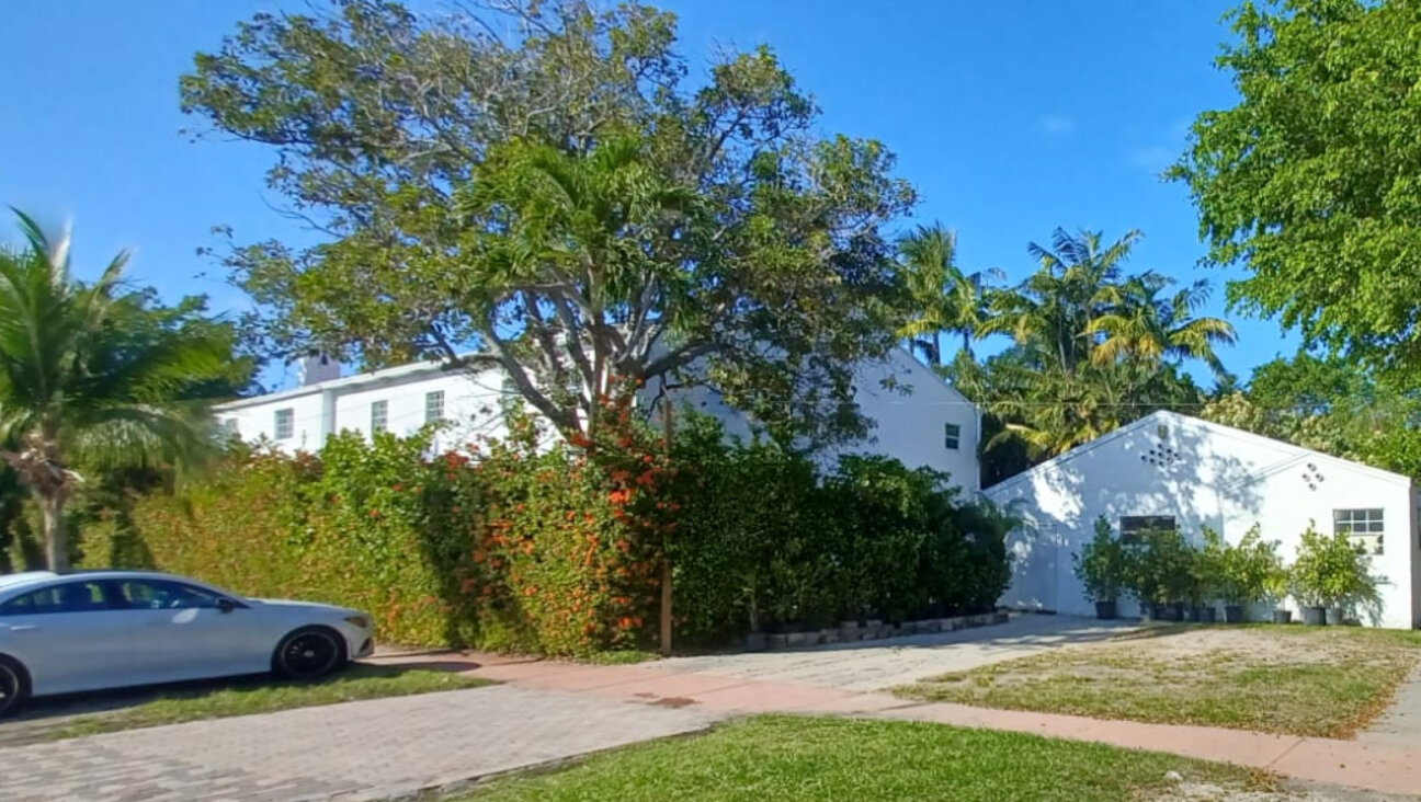 A group of Orthodox Jews bought this Miami Beach house in 2020. The city says it's a religious institution that violates the zoning code. 