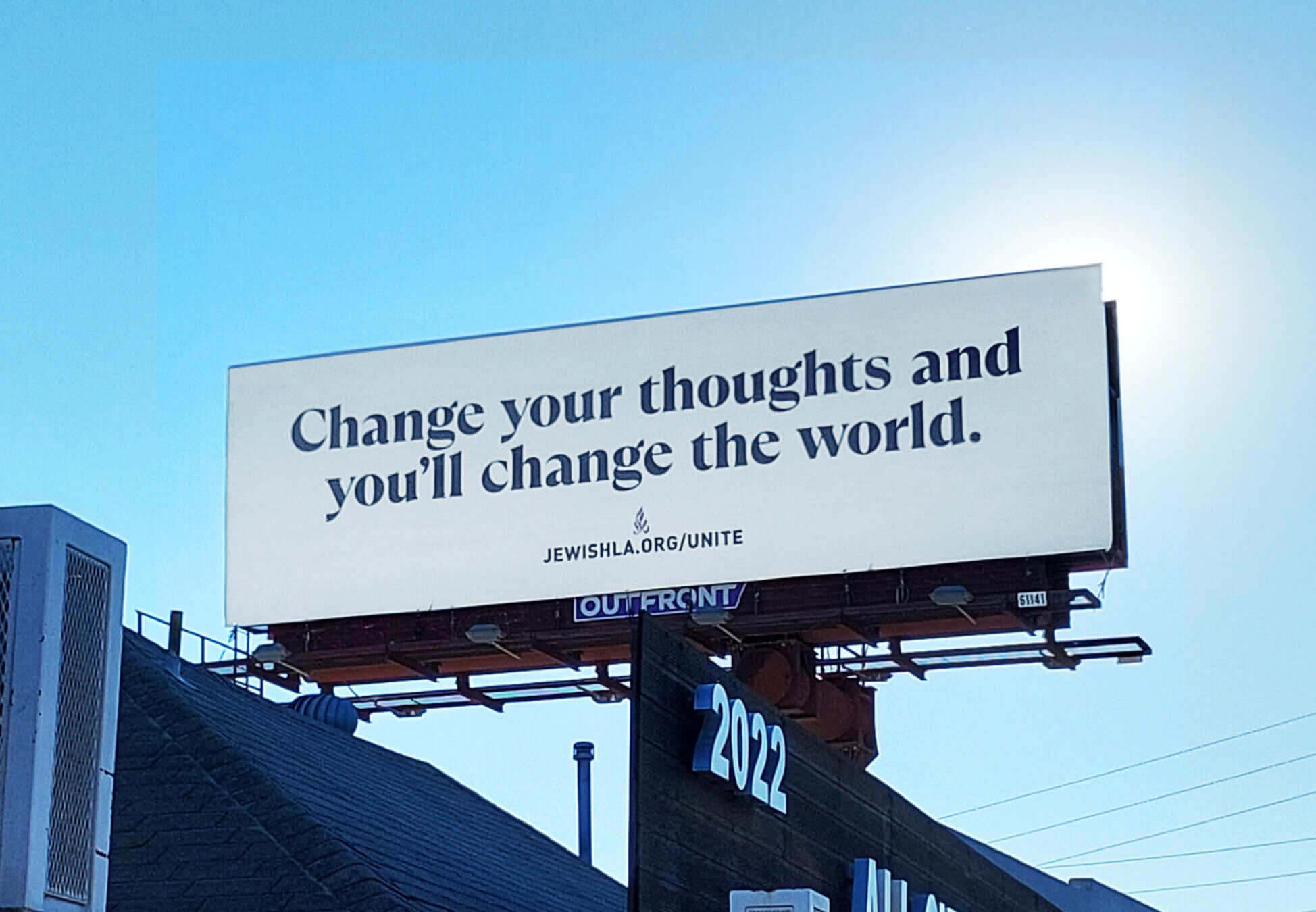 A quote usually attributed to Norman Vincent Peale, a Protestant clergyman, appears on a Jewish Federation billboard in West Los Angeles.