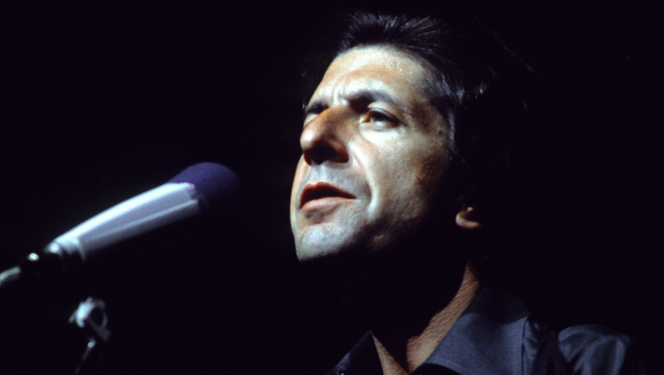 Leonard Cohen performs on stage in London circa 1975.