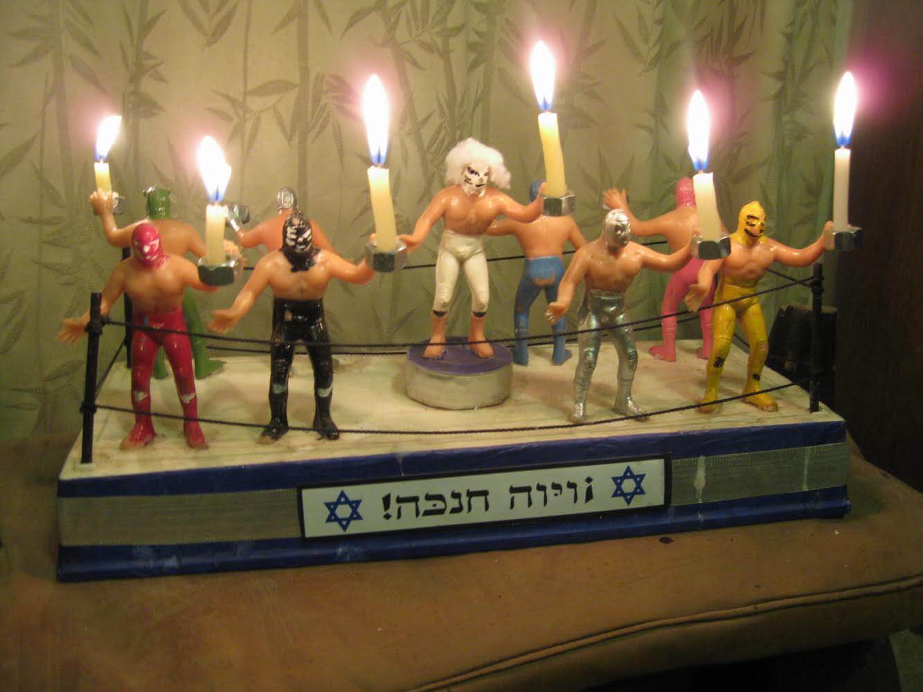 The "Luchador-ah Menorah," by Guinevere J. Thelin. No less vital for being non-halachic! 