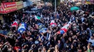 Mourners carry the bodies of Palestinians who were shot dead by Israeli security forces during a Military operation, in the West Bank city of Jenin, Jan. 26, 2023. (Nasser Ishtayeh/Flash90)