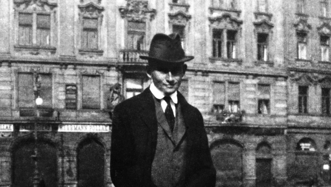 The Czech writer Franz Kafka posing before Kinsky Palace on the square of the old town in Prague, Czech Republic, where his father held a shop, around 1896-1906. (Photo by Keystone-France/Gamma-Keystone via Getty Images)