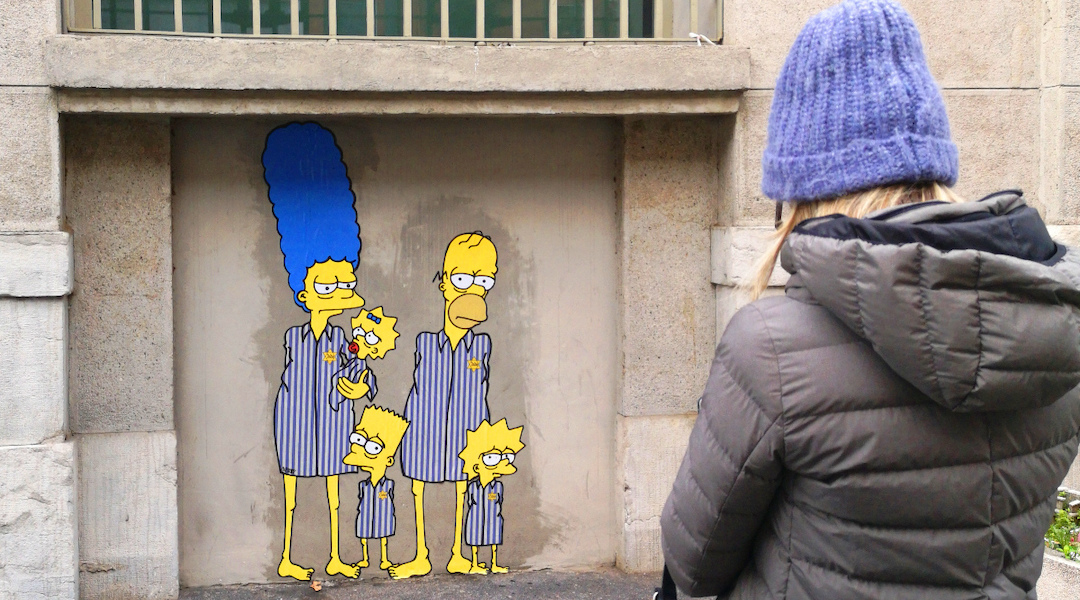 Artist aleXsandro Palombo painted several images of characters from “The Simpsons” on the outside of Milan’s central train station. (Courtesy of Palombo)