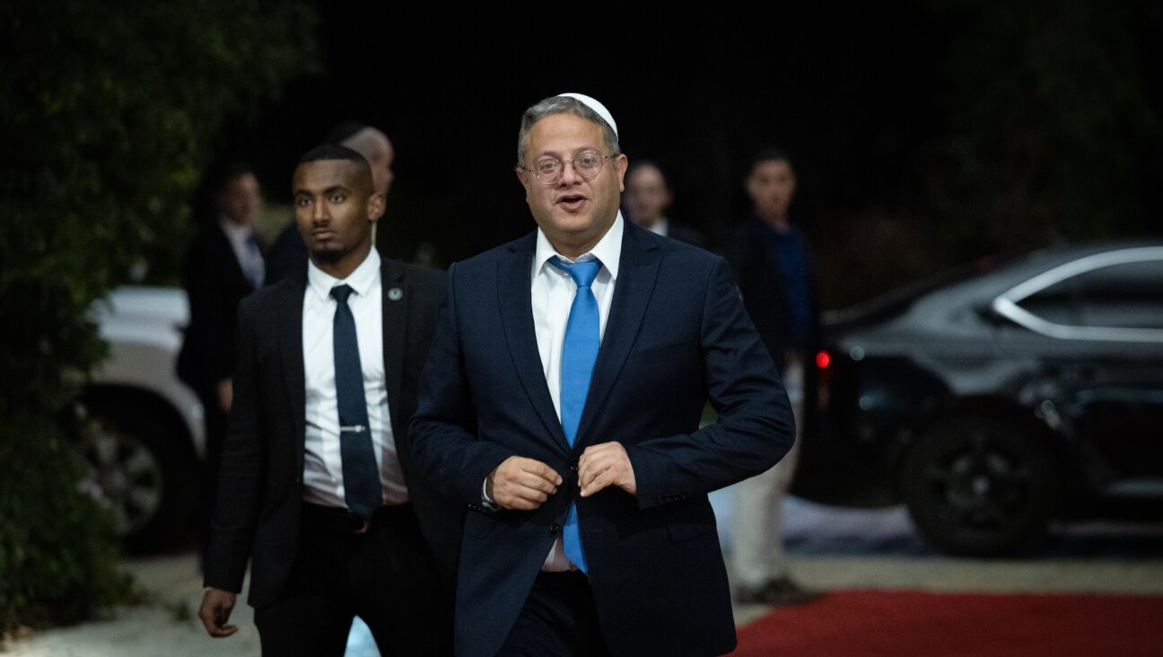 Itamar Ben-Gvir, Israel’s minister of national security, arrives for a group picture of the new government at the president’s residence in Jerusalem, Dec. 29, 2022. (Yonatan Sindel/Flash90)