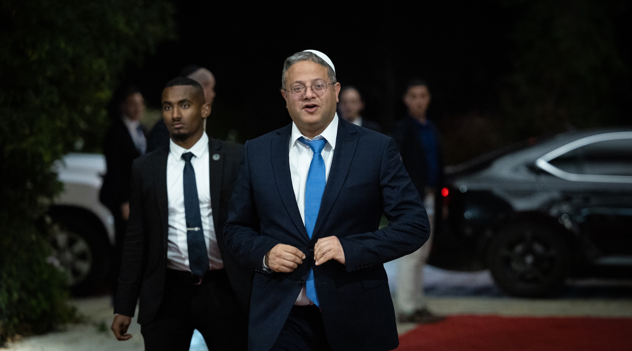 Itamar Ben-Gvir, Israel’s minister of national security, arrives for a group picture of the new government at the president’s residence in Jerusalem, Dec. 29, 2022. (Yonatan Sindel/Flash90)