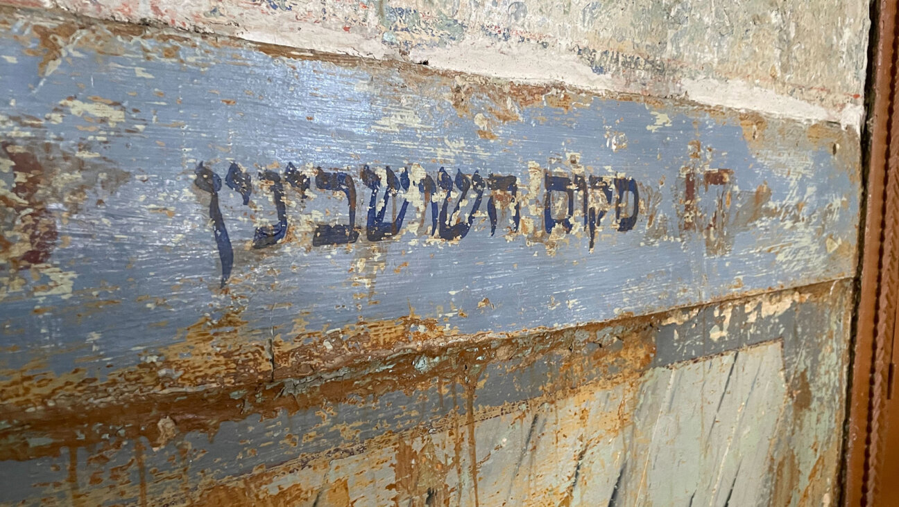 Restorations of the the Etz Hayyim Synagogue revealed a Hebrew inscription next the Torah ark which reads “Makom Hashushvinin,” meaning “place of the groomsman.” Whether the specific area was used for weddings is unclear. (David I. Klein)