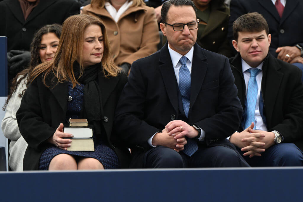 Josh Shapiro's wife Lori holds three Bibles for the swearing in on Jan. 17, 2023.