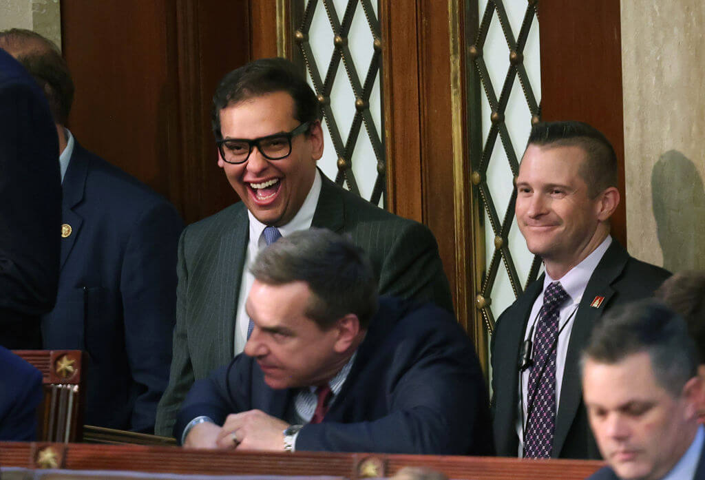 U.S. Rep.-elect George Santos (R-N.Y.) laughs in the House chamber during the second day of elections for speaker of the House at the U.S. Capitol Building on Jan. 4, 2023, in Washington, D.C.