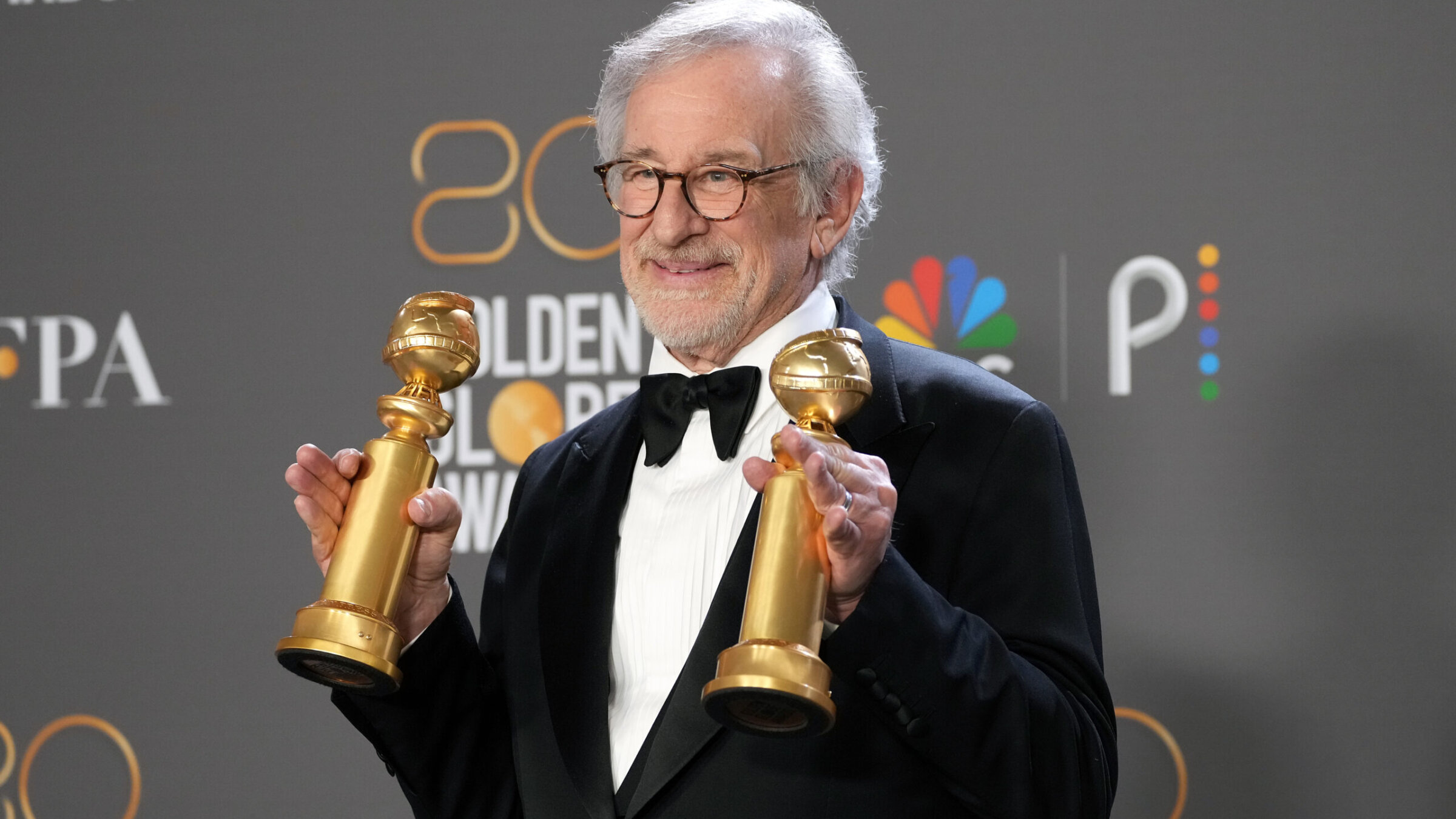 Steven Spielberg poses with the awards for best director and best picture for <i>The Fabelmans</i> at the 80th Annual Golden Globe Awards in Los Angeles, Jan. 10, 2023.