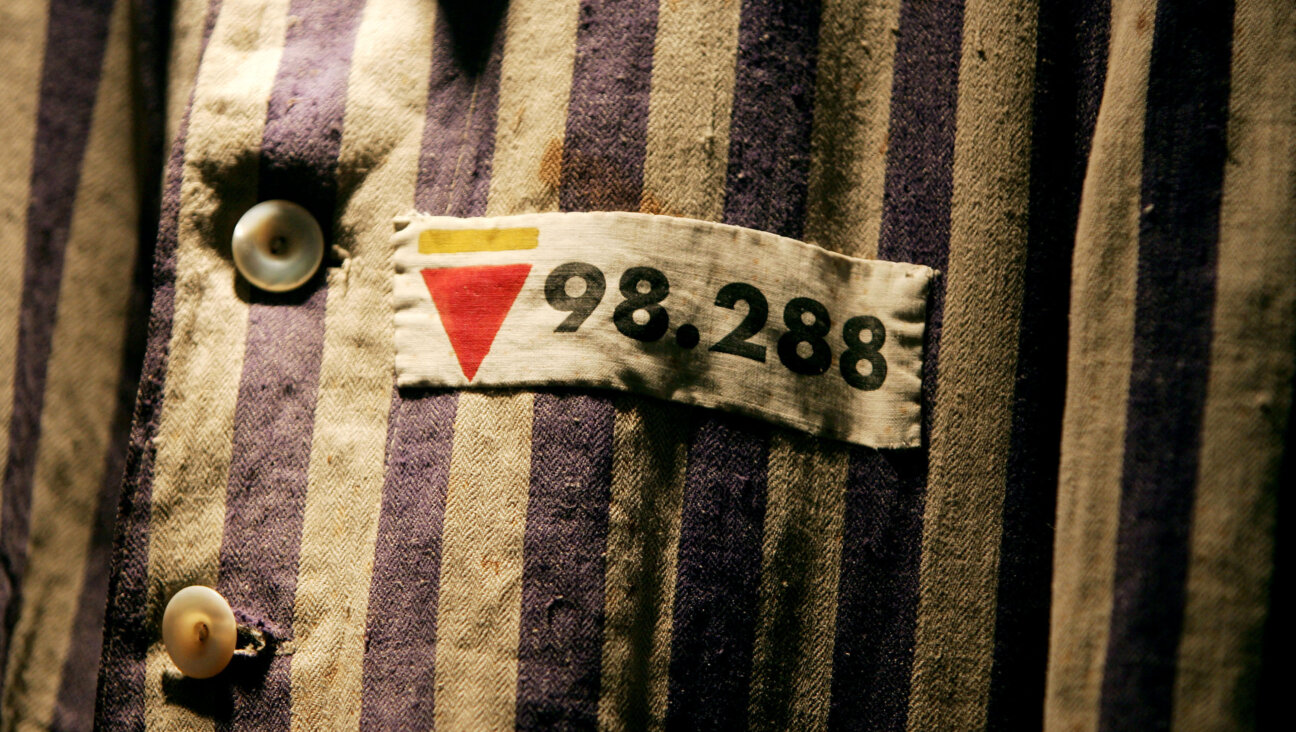 The prison uniform of Auschwitz survivor Leon Greenman, displayed at the Jewish Museum in London. Greenman spent three years of his life in six different concentration camps during World War II.
