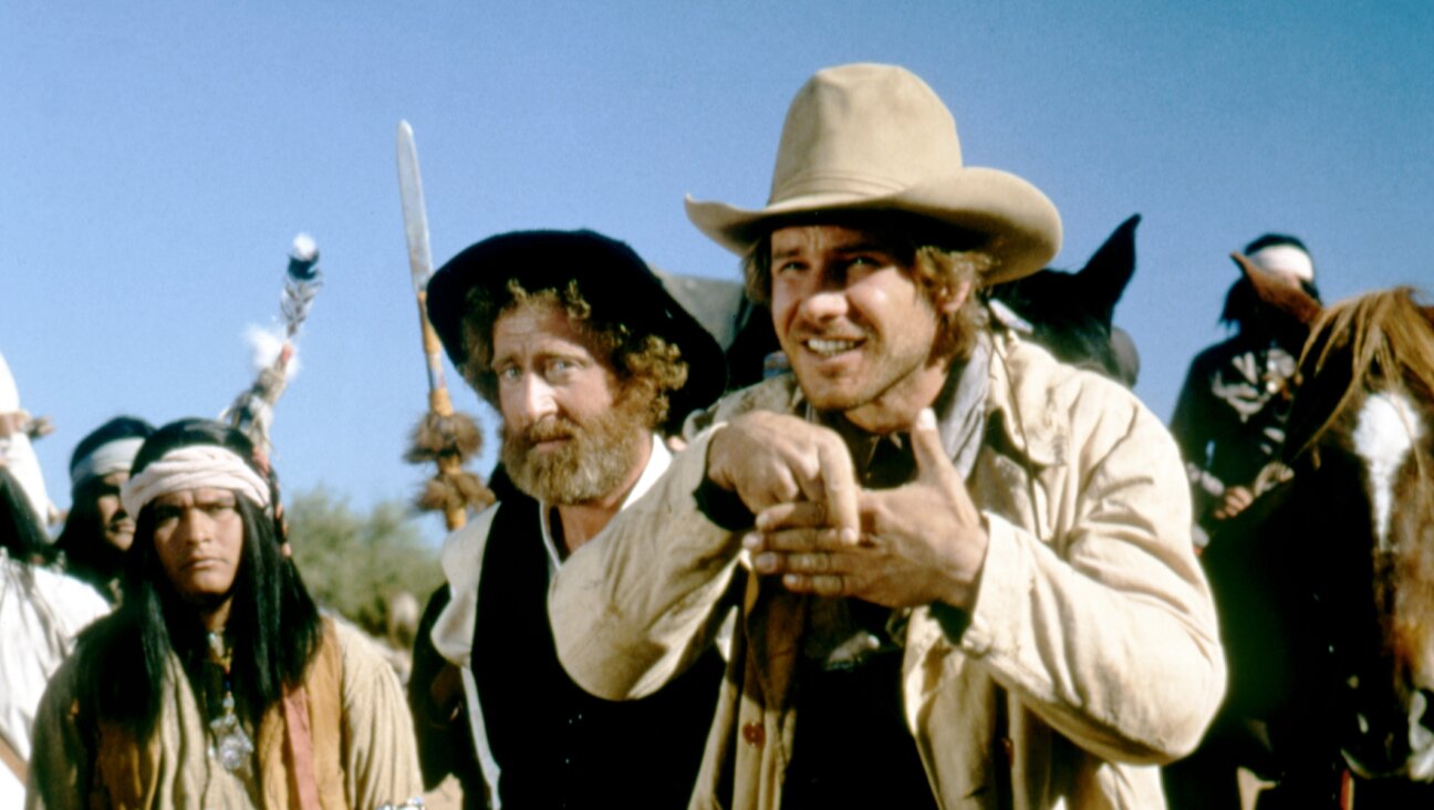 Gene Wilder, center, plays a Polish rabbi in the 1979 film “The Frisco Kid,” alongside Harrison Ford.