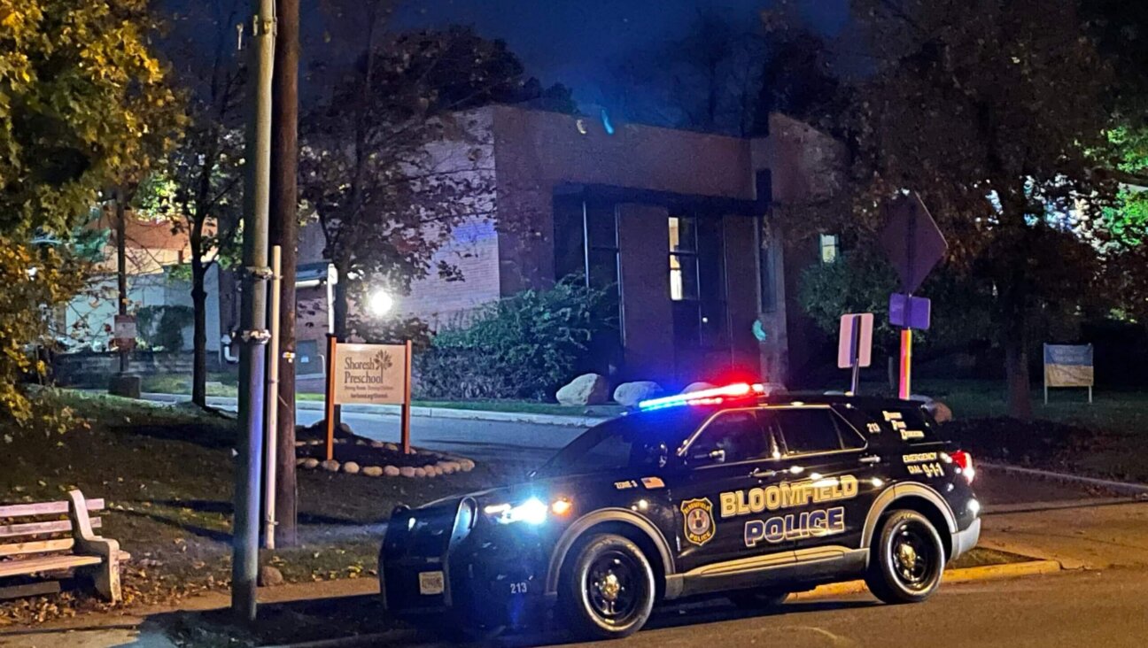 A police car stationed outside of Temple Ner Tamid’s preschool in Bloomfield, New Jersey, after a threat to local area synagogues in November, 2022. A Molotov cocktail was thrown at the synagogue early Sunday morning.