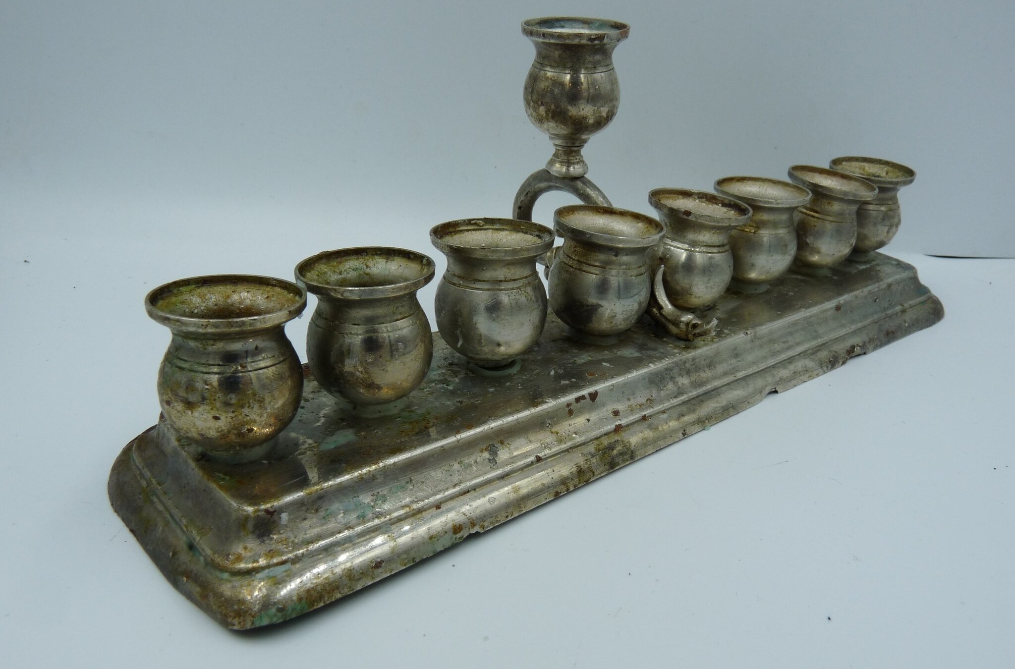 A menorah found by construction workers in a Lodz tenement. (Facebook/Provincial Office for the Protection of Monuments in Łódz; used in accordance with Clause 27a of the Copyright Law)