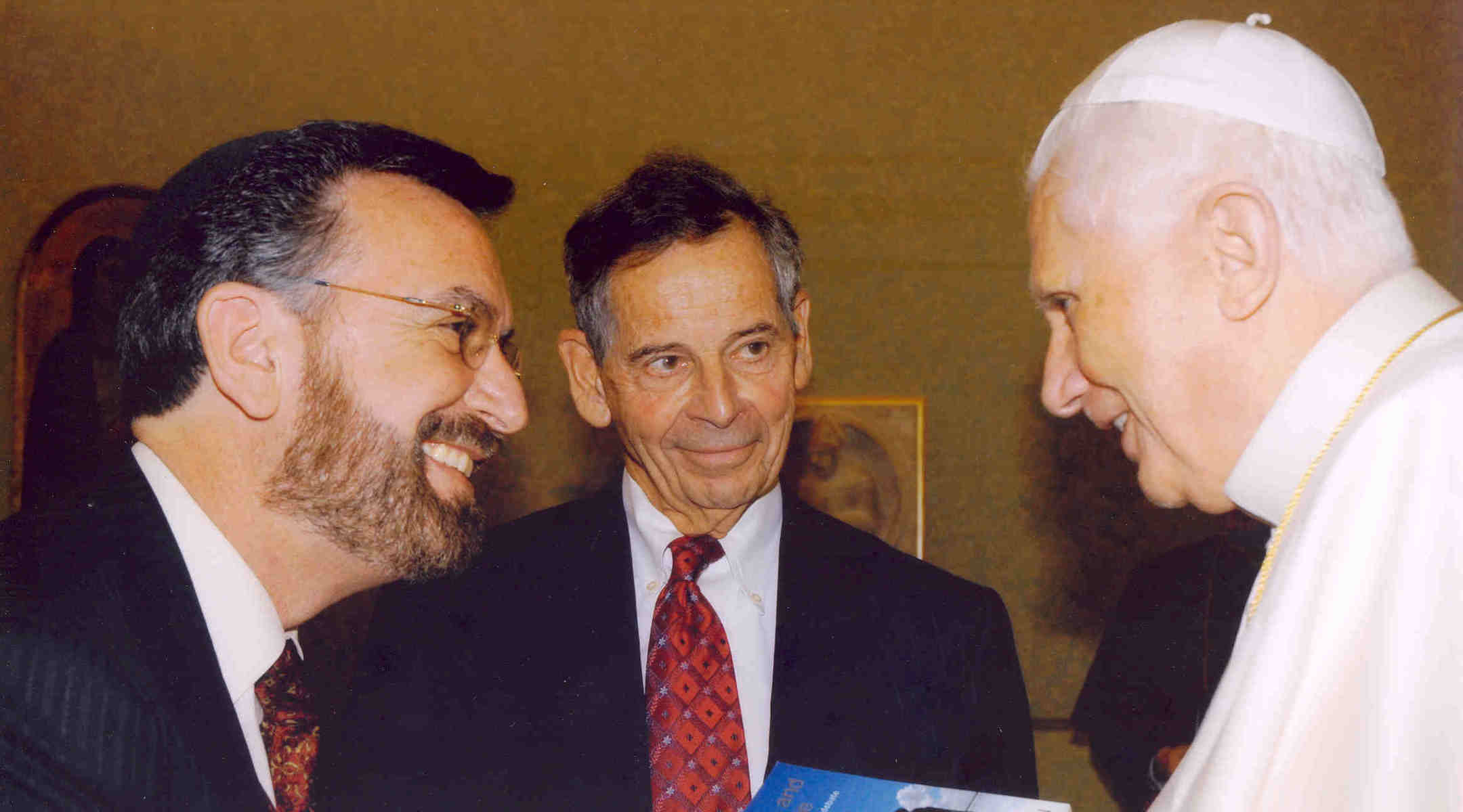 Rabbi David Rosen, left, meets with Pope Benedict XVI, right, during the American Jewish Committee’s leadership audience with the pope at the Vatican, March 2006. At center is E. Robert Goodkind, AJC president at the time. (American Jewish Committee)