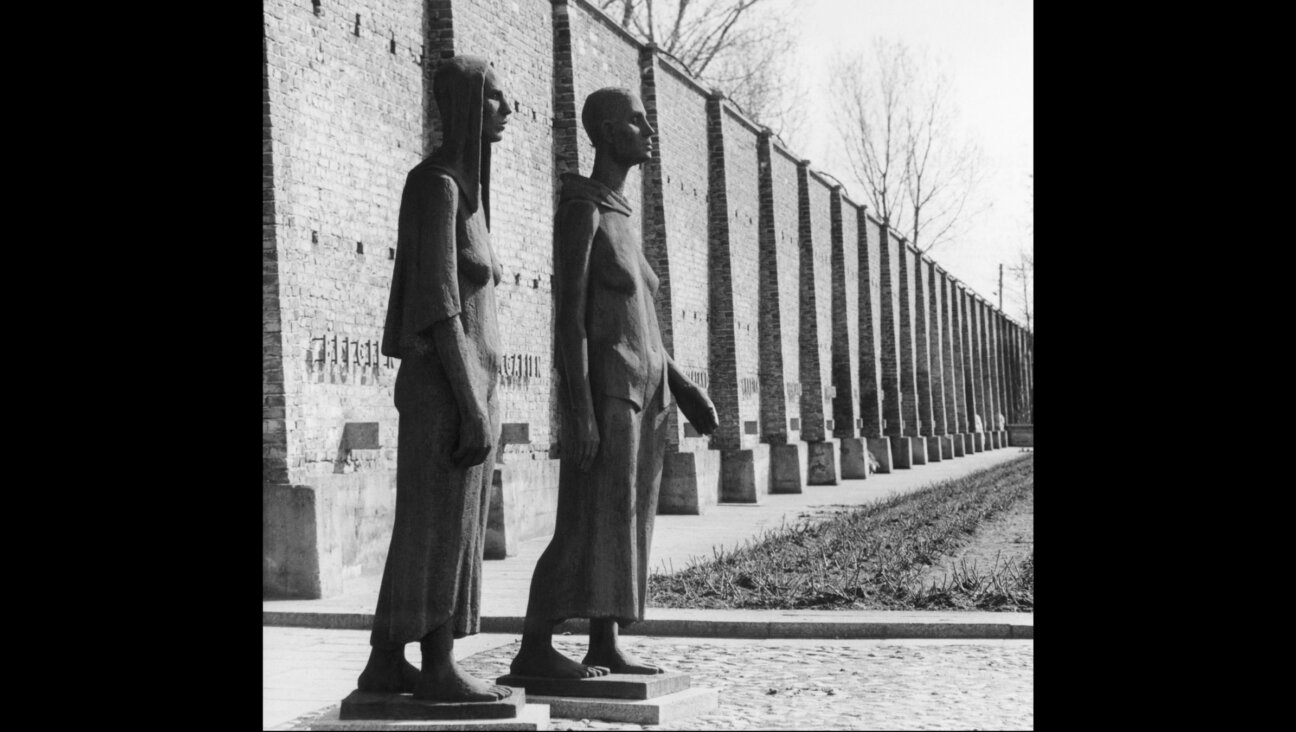 A 1965 photo of two statues in front of Ravensbruck, the Nazi concentration camp.