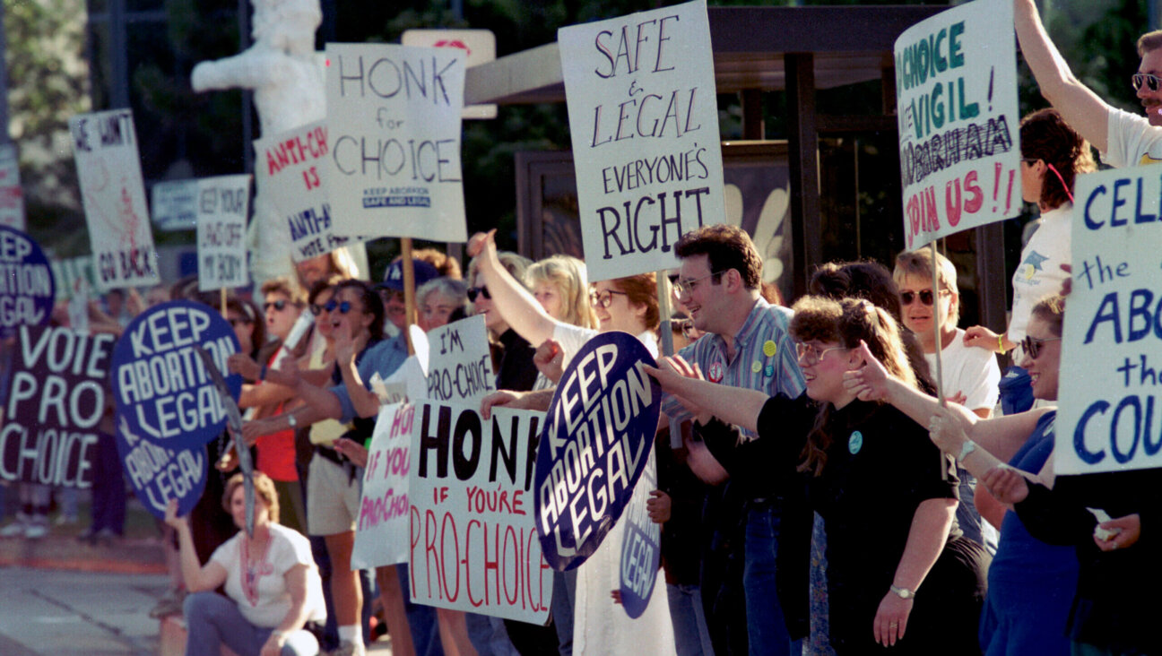 Pro-Choice supporters displaying signs were joined Attorney Gloria Allred and Norma McCorvey, 'Jane Roe' plaintiff from Landmark court case Roe vs. Wade, during a Pro Choice Rally, July 4,1989 in Burbank, California. 