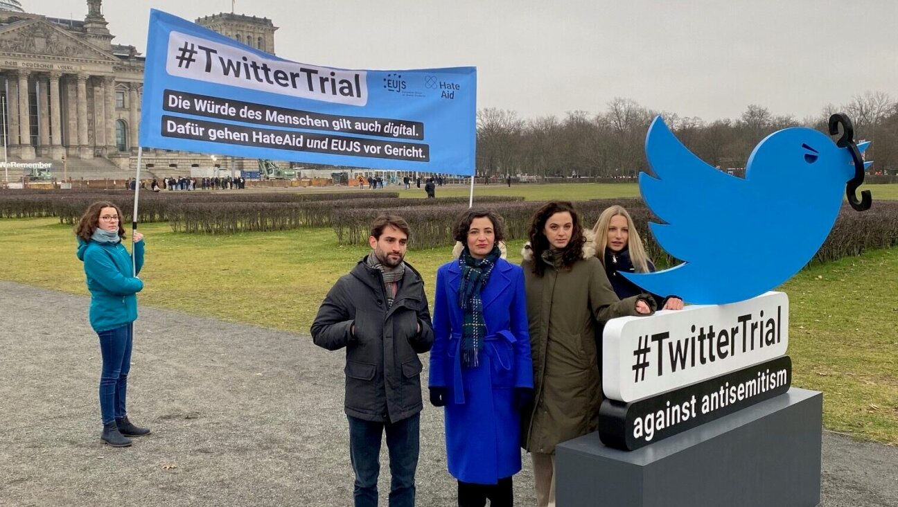 Members of the European Union of Jewish Students stand outside the Bundestag, Germany’s parliament, as they announce a lawsuit against Twitter over antisemitism on the platform. (Courtesy EUJS)