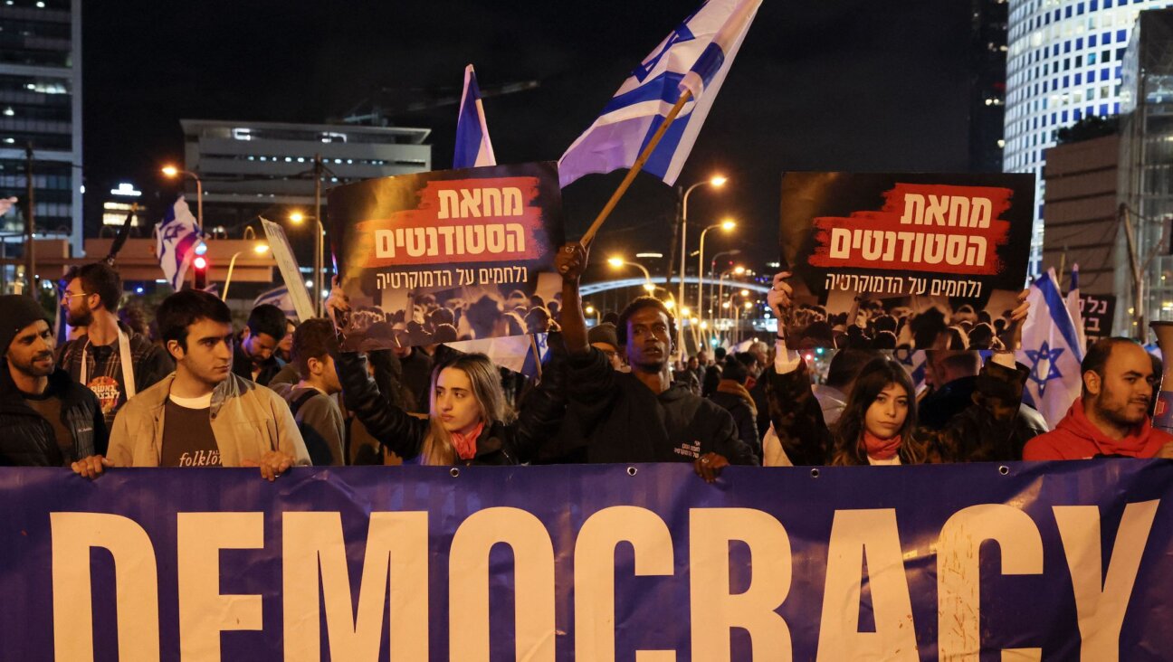 Israelis march during a rally against government plans to give lawmakers more control of the judicial system, Tel Aviv, Feb. 4, 2023. (Jack Guez/AFP via Getty Images)