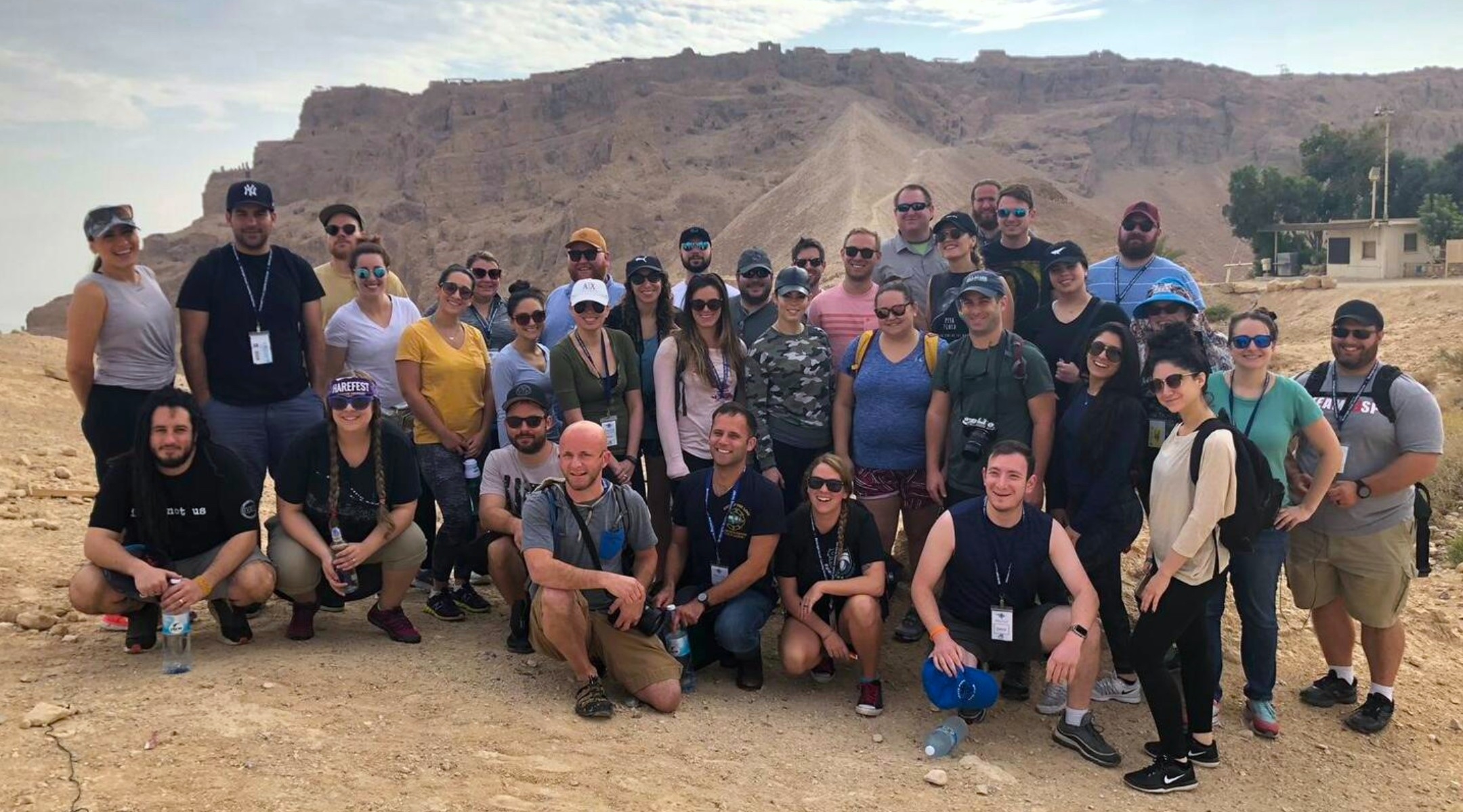 Participants of a 2018 Birthright trip for adults ages 27-32 visit the Masada fortress in Israel. (Courtesy of Ashley Inbar)