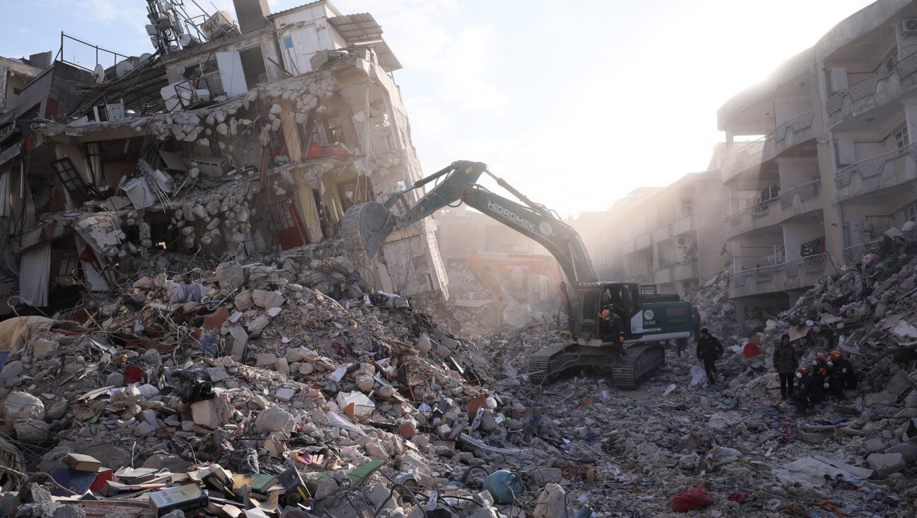 Demolishing works and debris removal efforts continue in Antakya, Turkey, Feb. 16, 2023. (Erhan Sevenler/Anadolu Agency via Getty Images)