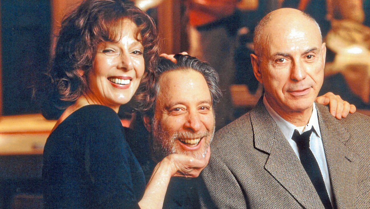 Julian Schlossberg, center, is shown with Elaine May and Alan Arkin. Schlossberg’s memoir looks back at all the celebrities he met — many of them Jewish — during his career as a prolific producer. (Courtesy of Julian Schlossberg)
