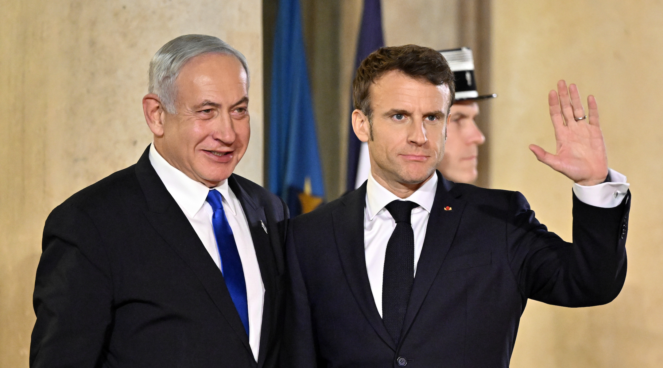 Israeli Prime Minister Benjamin Netanyahu and French President Emmanuel Macron pose prior to a working dinner at the Elysee Palace in Paris, Feb. 2, 2023. (Mustafa Yalcin/Anadolu Agency via Getty Images)