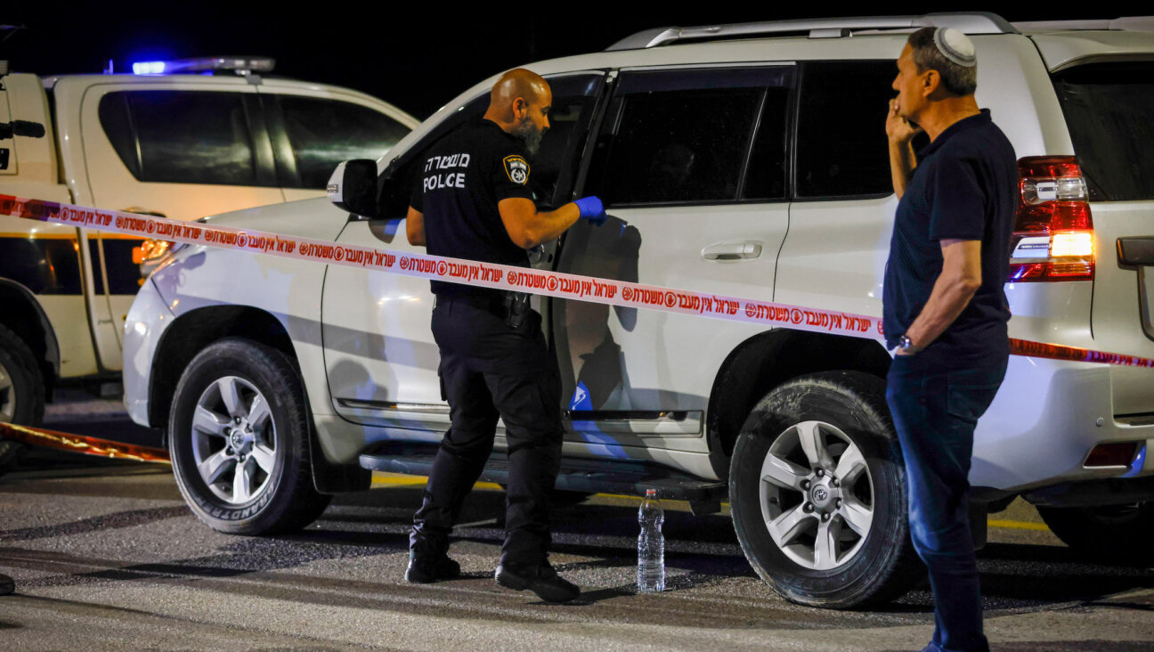 Israeli security forces guard the scene of a shooting attack near Jericho on February 27, 2023. (Erik Marmor/Flash90)