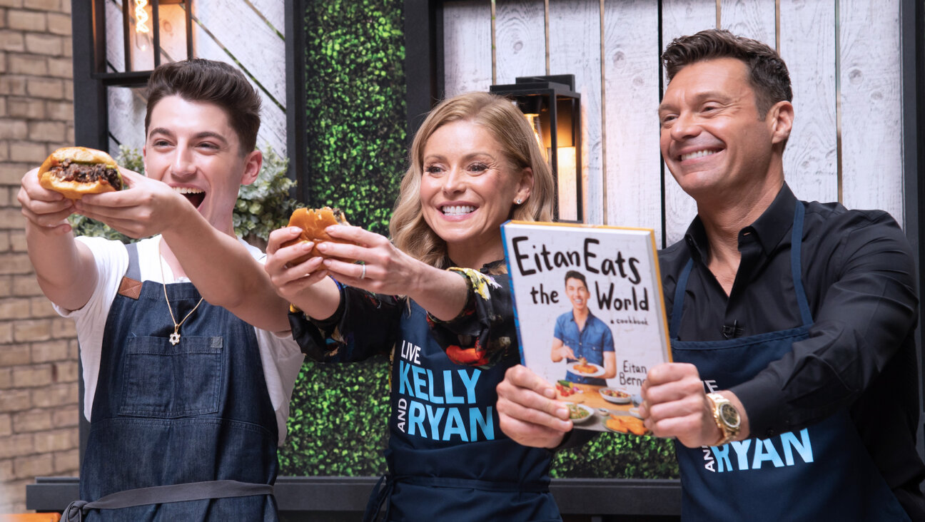Eitan Bernath, Kelly Ripa and Ryan Seacrest film a cooking spot on “Live with Kelly and Ryan” at ABC Studios in New York, June 2, 2022. (MEGA/GC Images/Getty Images)