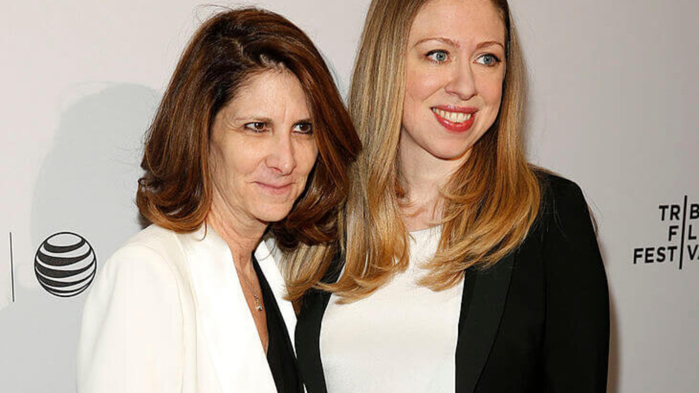 NYU's next president, Linda G. Mills, who is also a filmmaker, pictured here with Chelsea Clinton during the 2014 Tribeca Film Festival in New York City.  
