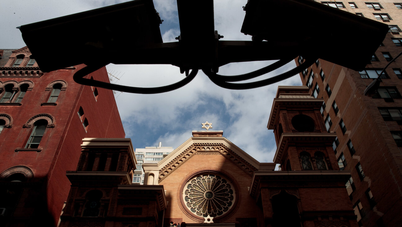 Security cameras hang across the street from the Park East Synagogue in New York City. (Drew Angerer/Getty Images)
