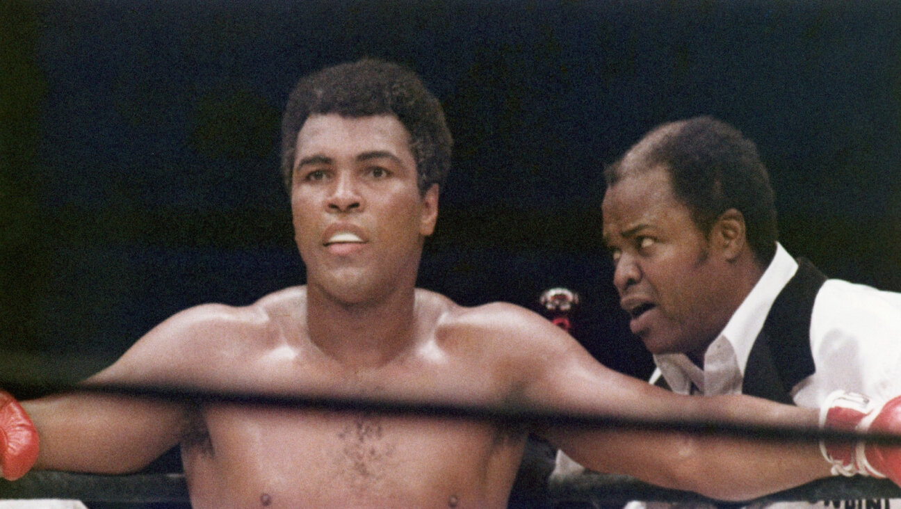 Muhammad Ali stands between rounds next to cornerman Drew Bundini Brown during the heavyweight championship against Earnie Shavers at Madison Square Garden on Sept. 29, 1977.  Robert Riger/Getty Images