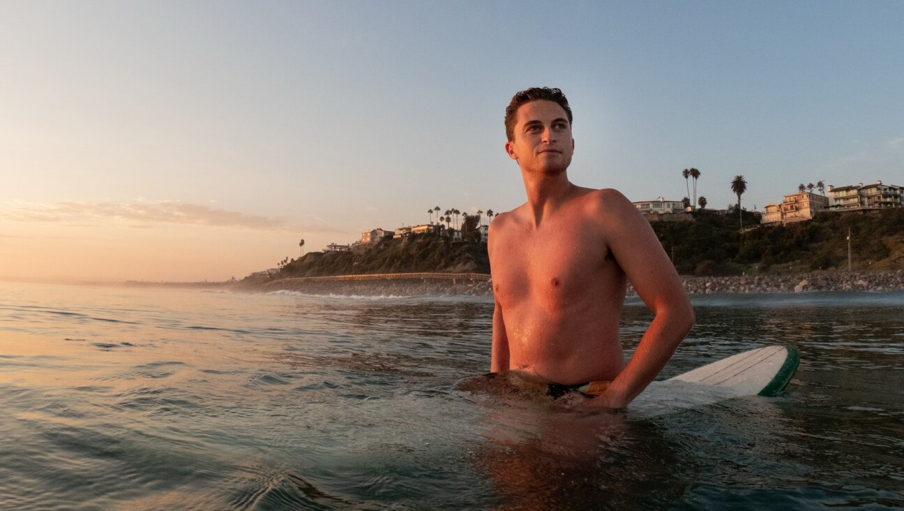 Josh Greene directed “Waves Apart,” a documentary about the antisemitic history of surfing. (Courtesy)