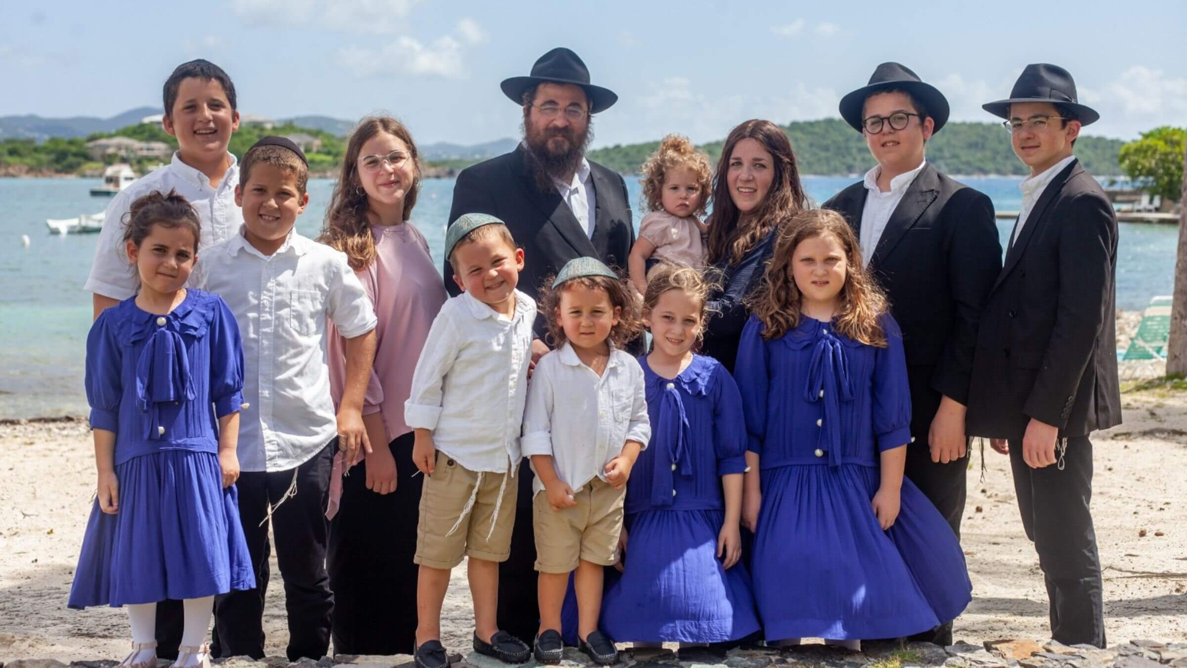 Henya Federman, pictured top row, third from right. She is survived by her husband, Rabbi Asher Federman, and their 12 children. 