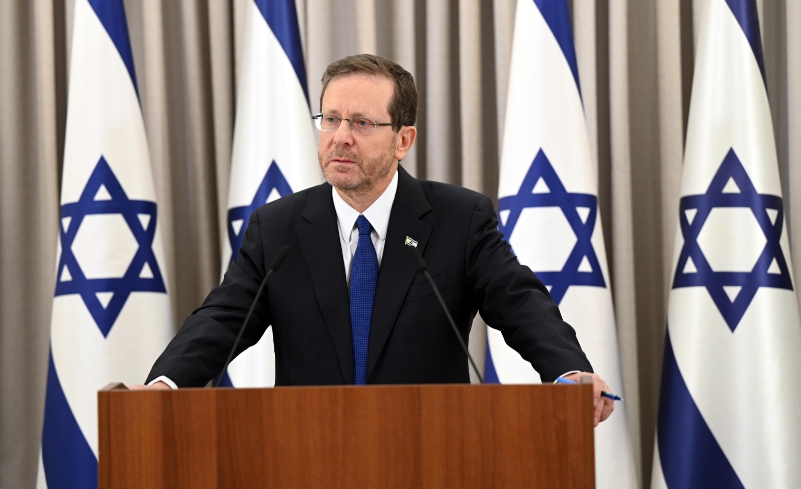 Israeli President Isaac Herzog addresses the nation in a speech exhorting a delay on proposed judicial reforms, Feb. 12, 2023. (Courtesy Herzog’s office)