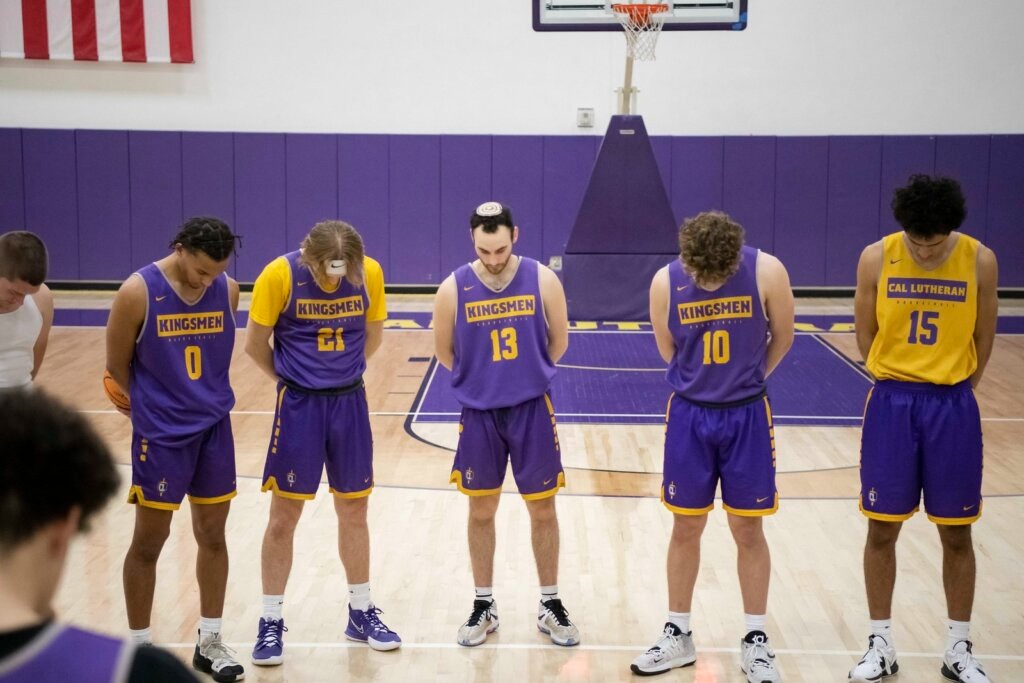 Ze'ev Remer was called on to lead his basketball teammates in prayer after a recent practice. (Jon Putman)