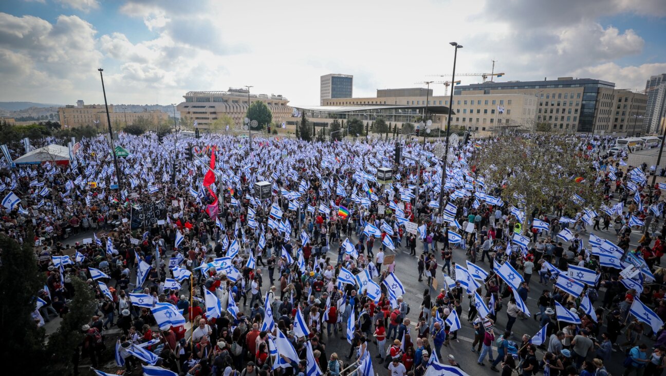 Israelis protest against the government’s planned judicial overhaul, outside the Supreme Court in Jerusalem, March 27, 2023.