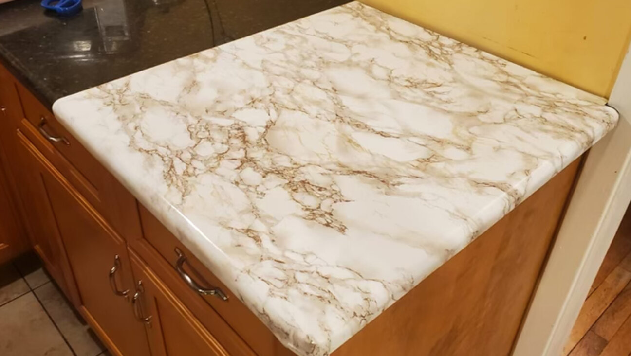 Kosher Dekal is coming back with a new design and formula for its counter top linings that caused a scandal last year after customers had trouble taking them off their counters. (Courtesy)
