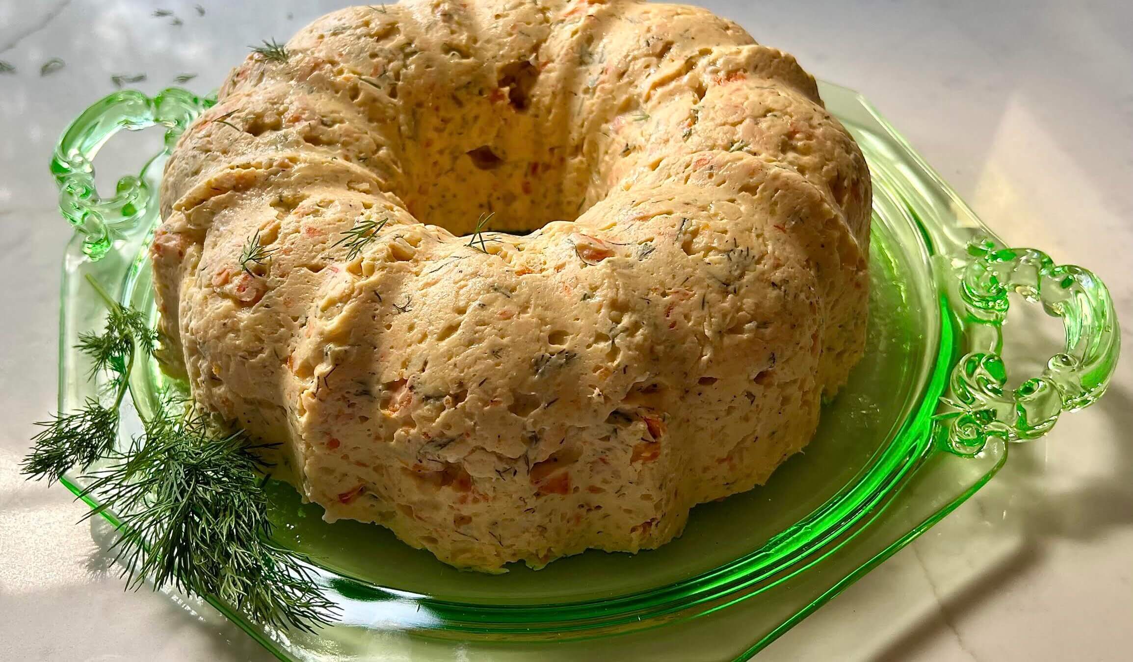Believe it or not, that's gefilte fish, reinvented with salmon and cooked in a bundt pan!
