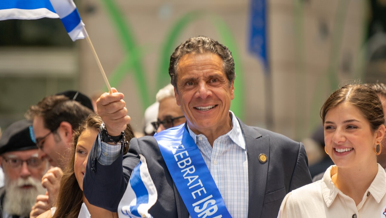 Former New York state Gov. Andrew Cuomo marches in the Celebrate Israel Parade moments after he condemn the rise of anti semitism across the United States on June 2, 2019 in New York City.