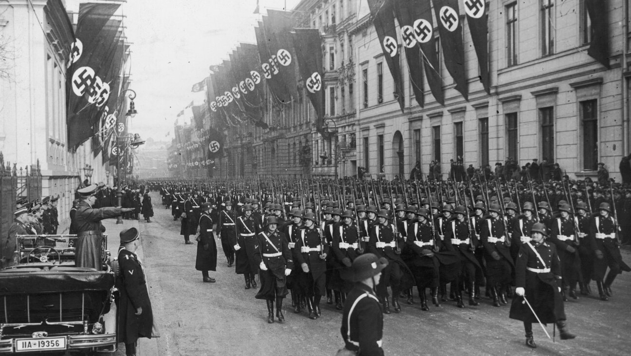 Adolf Hitler salutes his personal bodyguard regiment, the Leibstandarte SS, in 1937. Rolling Stone found a playlist named for the unit on Spotify. 