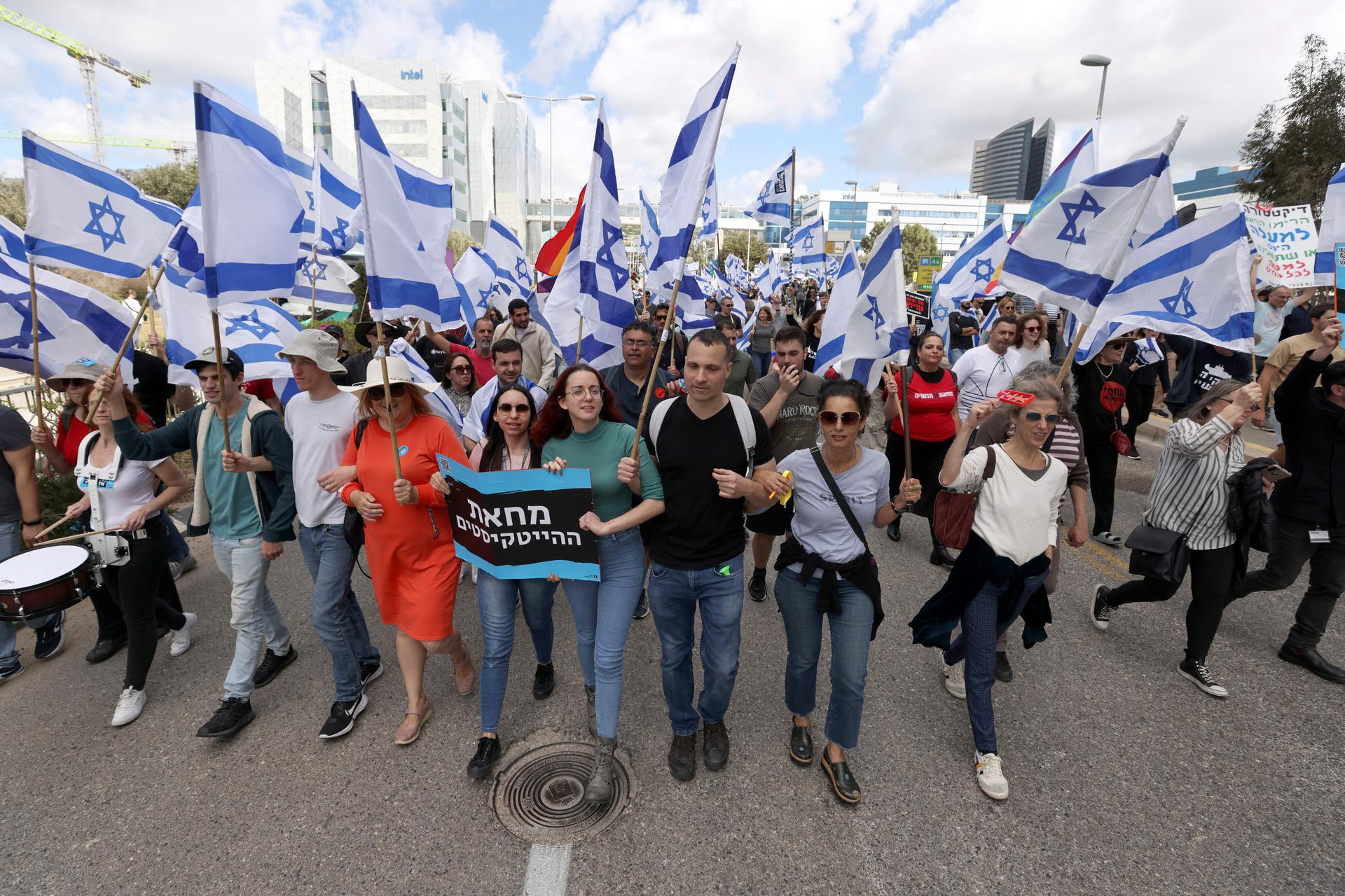 Israelis protest against their government's controversial judicial reform bill, in Haifa on March 9, 2023.