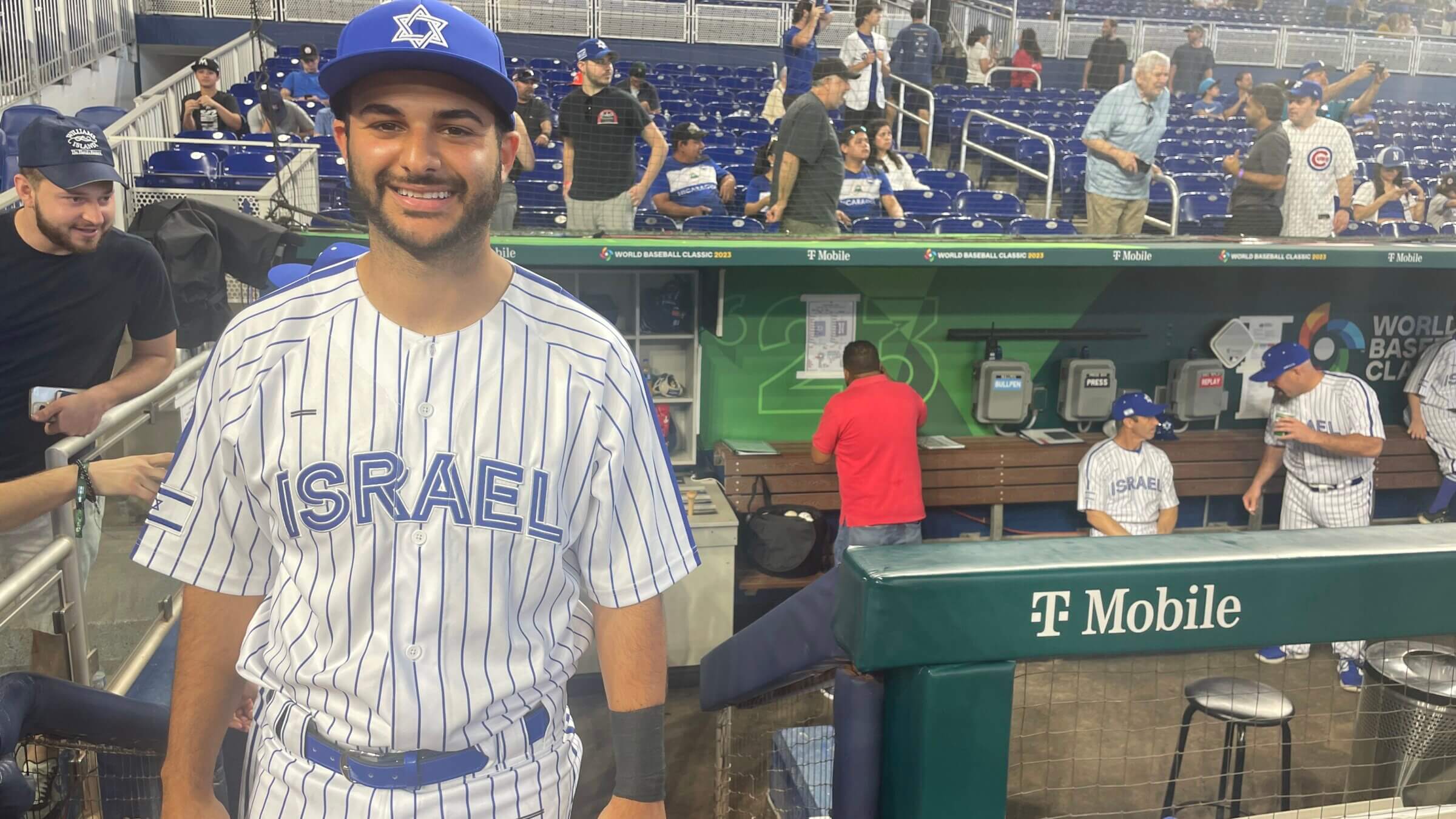 Tal Erel came up in the Israeli Association of Baseball. Now he's serving as Team Israel's bullpen catcher at the World Baseball Classic.