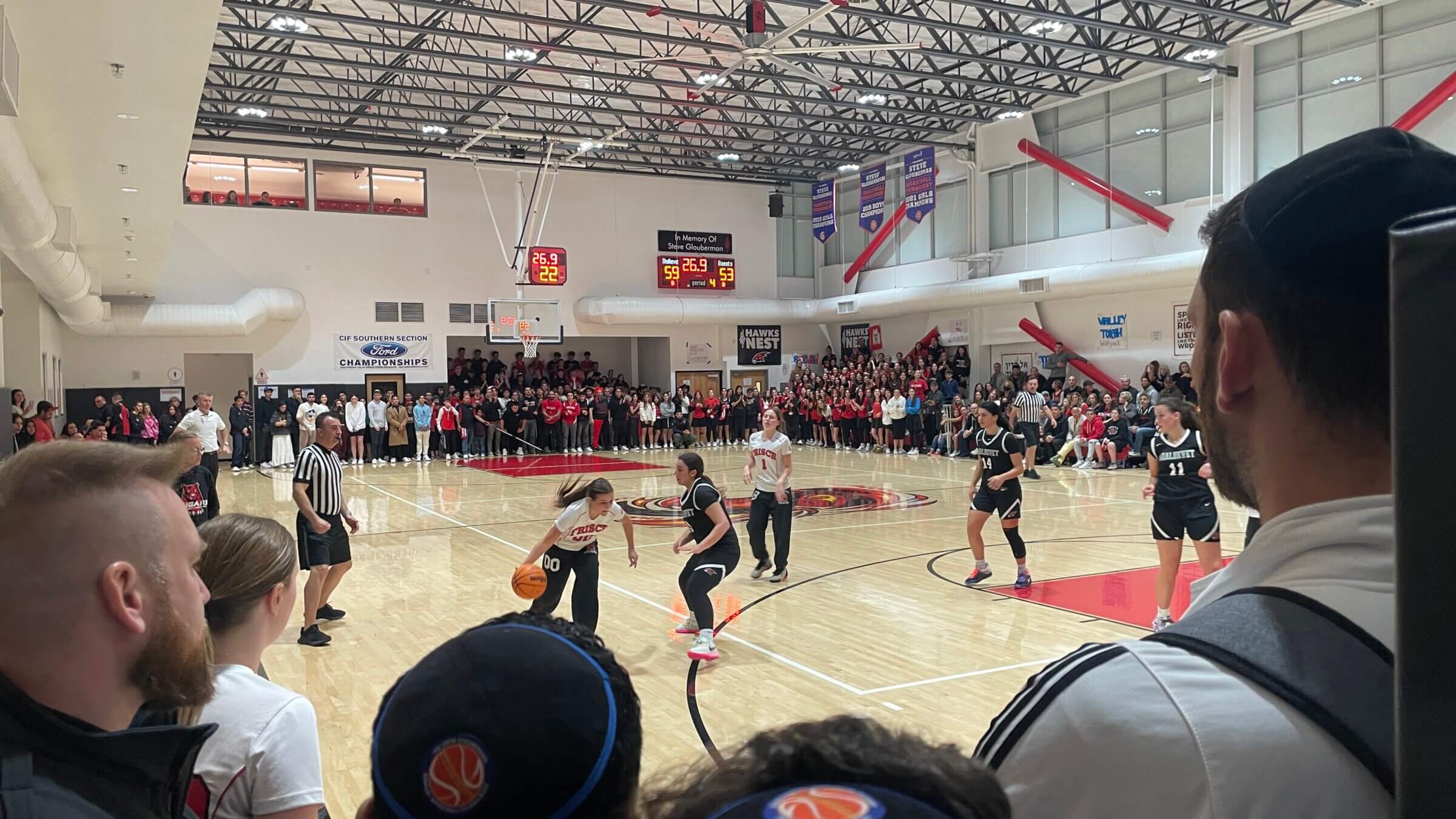 Fans look on during a Shalhevet High School girls' basketball game on November 5, 2022.