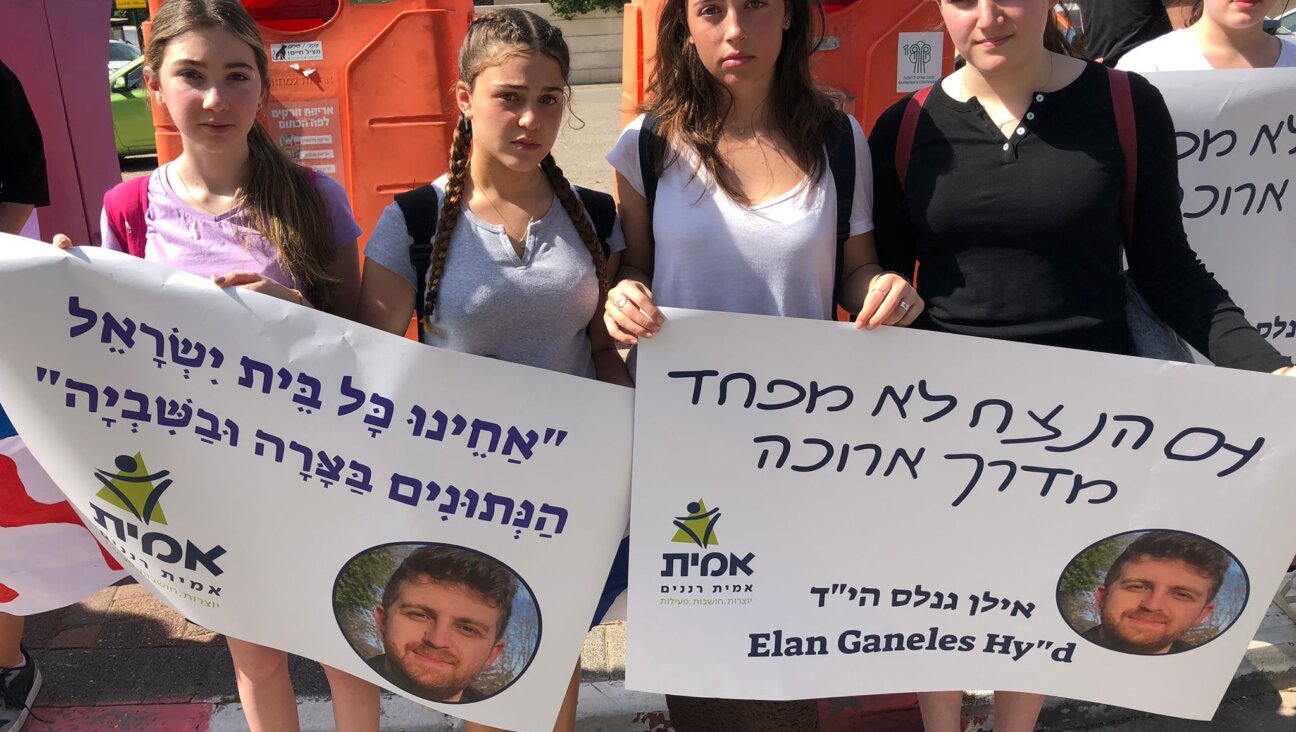 Maytal Weiser, second from right, in white shirt, 16, did not know Elan Ganeles but came to his funeral with friends to "support the family and show that the nation is one."