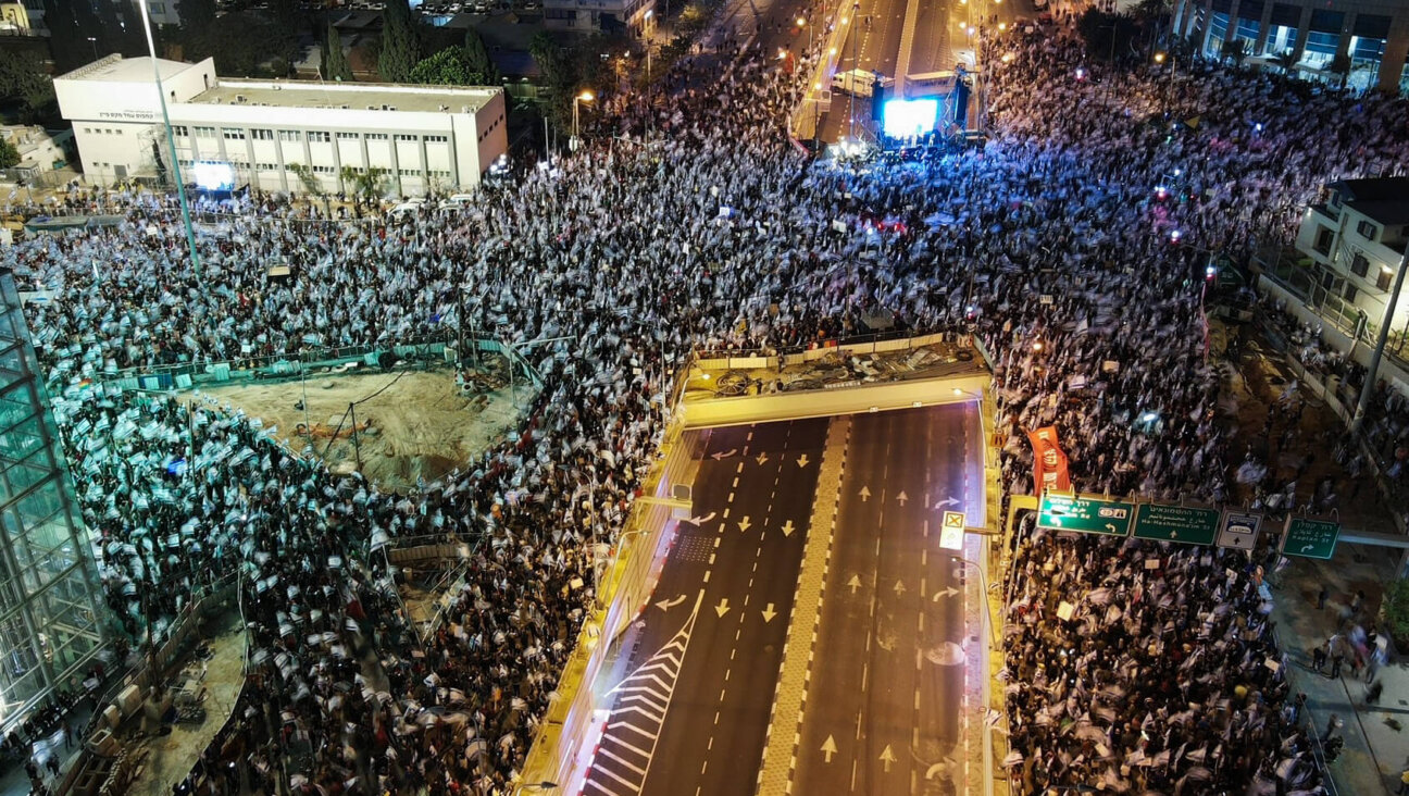 An aerial picture shows a protest against the Israeli government's controversial judicial reform bill in Tel Aviv on March 11, 2023. 