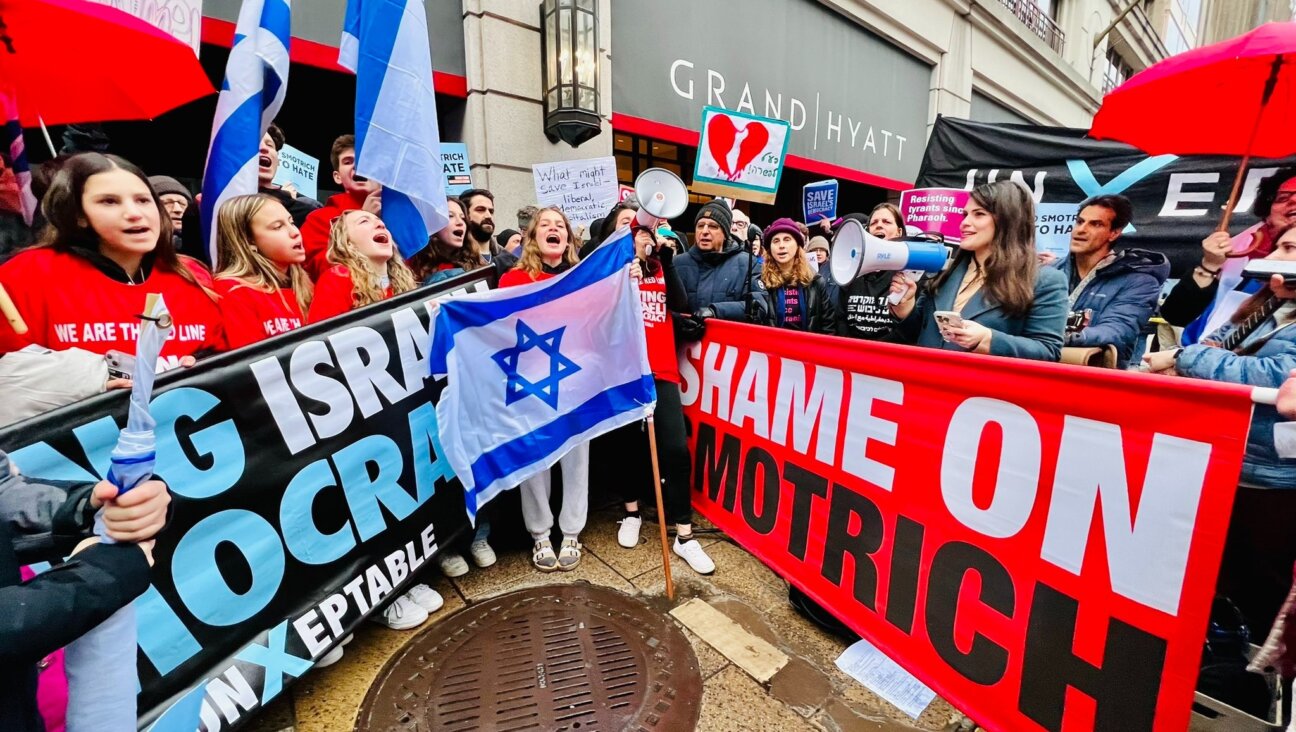 Sheila Katz, chief executive of the National Council of Jewish Women, addresses several hundred protesters gathered outside the Washington, D.C., hotel where Bezalel Smotrich, the far-right Israeli finance minister, was speaking to an Israel Bonds conference.